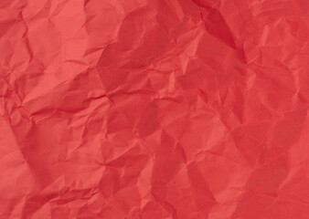 Wrinkled sheet of red, paper. Textured backdrop
