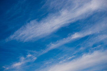 Blue sky cirrus clouds.