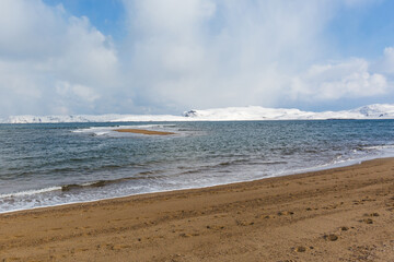 Shore near Teriberka, Barents Sea bay winter landscape. Russia