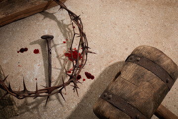 Crucifixion Of Jesus Christ. Wooden Cross With Nails And Crown Of Thorns on stone background