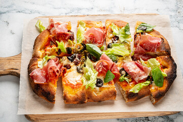 italian pizza on the wooden board