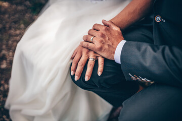 bride and groom holding hands