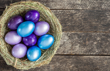 different shades from blue to purple   colors painted easter eggs. Happy Easter Card	