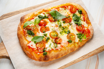 italian pizza on the wooden board