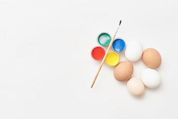Chicken eggs and paints