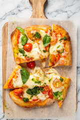italian pizza on the wooden board