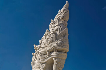 Abstract decoration of mystical creature head at the Big Buddha or Great Buddha of Phuket marble made statue at Phuket, Thailand.