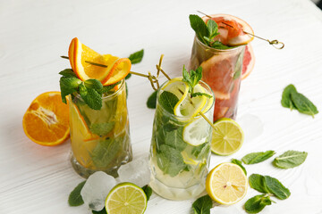 assorted cocktails on a wooden table
