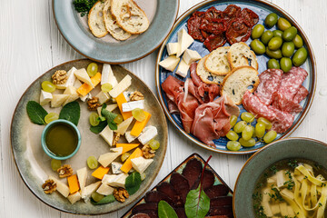Italian cold snacks on a wooden table
