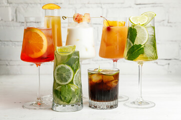 assorted cocktails on a wooden table
