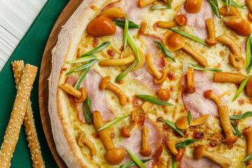 Italian pizza on a white wooden table
