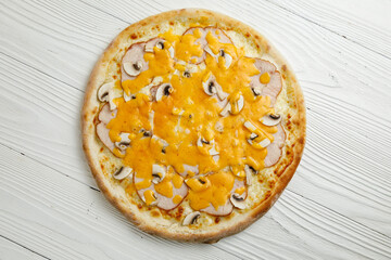 Italian pizza on a white wooden table
