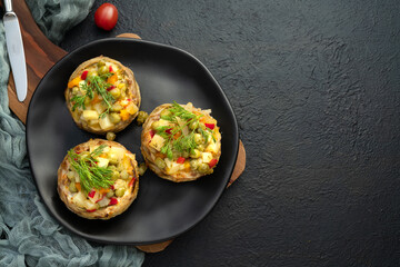 Artichoke dish with peas on black 