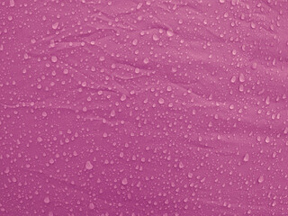 Water drops on waterproof membrane fabric. Morning dew on tent.