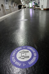 Sticker in Paris Metro during Covid-19 pandemic