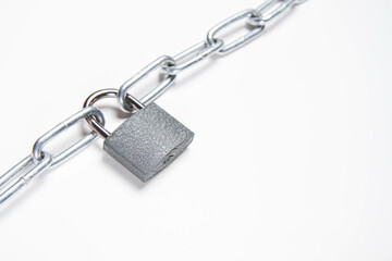 Chain and padlock on an isolated background. closed door. Metal chain.