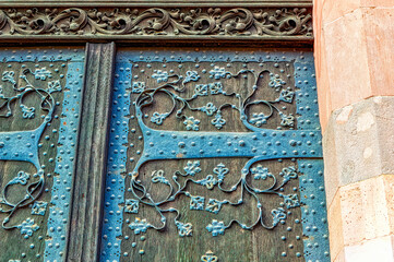 Traditional metal decoration on entrance door.