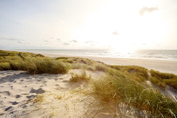 View to beautiful landscape with beach and sand dunes near Henne Strand, North sea coast landscape...
