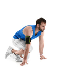 Sporty male runner on white background