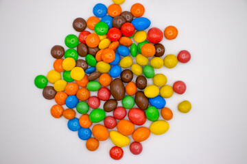 colored candies on a white background