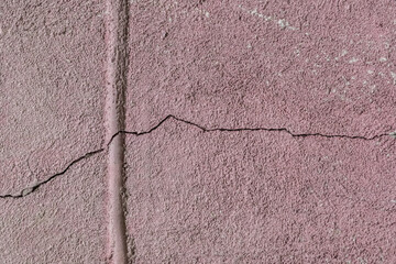 Obraz premium Crack split old wall facade building broken surface texture cracked background