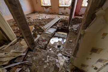 Destroyed floor of the apartment on the second storey of the house abandoned by the residents. Destroyed by an explosion residential apartment building.