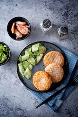 Shrimp patties with cucumber in a plate