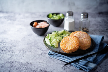 Shrimp patties with cucumber in a plate