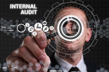 Business, technology, internet and network concept. Young businessman thinks over the steps for successful growth: Internal audit