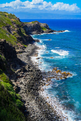 Aerial view of the cliffs of Lipoa Ridge above the Pacific Ocean along the Honoapiilani Highway in...