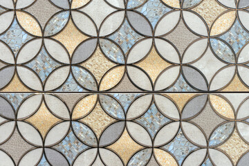 Ceramic tiles with a pattern of interlaced circles. Tile background for design and decoration.