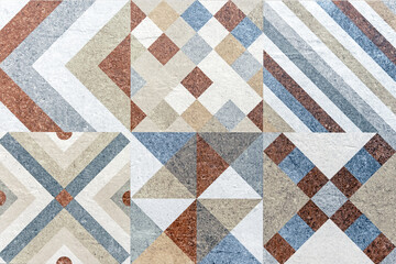 Matte ceramic tiles with multi-colored patterns. Tile background for design.