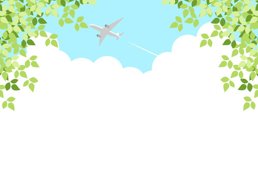 入道雲と飛行機の新緑背景