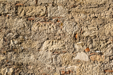 The art texture of stone wall from stones. Stonewall background. A backing with natural stones for branding, calendar, postcard, screensaver, wallpaper, poster, banner, cover, website