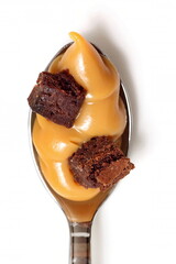 spoons with chocolate cream, caramel and dulce de leche. Easter egg fillings.