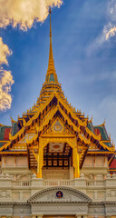 Fototapeta premium Traditional structure with decoration at Buddhist temple walls in Thailand.