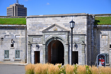 Naklejka premium Dalhousie Gate of La Citadelle of Quebec National Historic Site in Old Quebec City, Quebec QC, Canada. The fortress is in Historic District of Old Quebec World Heritage Site. 