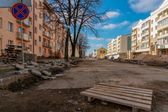 View of the construction site in the city. The restoration of Godard after the war. Repair of pavement and sidewalk.