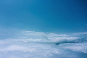 Naklejka na ściany i meble Drone view of cloudscape over the cloud