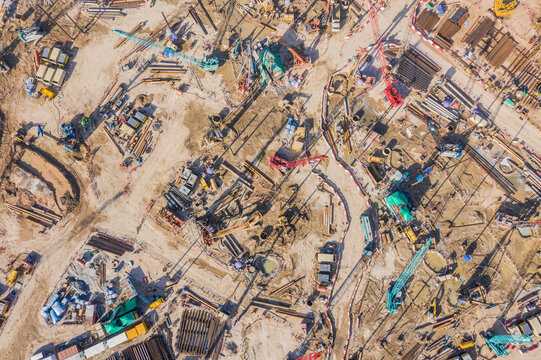 29 feb 2020 - Kowloon, Hong Kong : Massive construction site with crane and machine in Kai Tak Area. previous location of the Hong Kong Airport, Kowloon, Hong Kong, Daytime