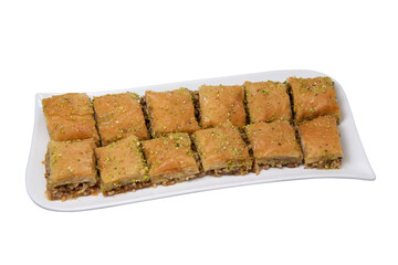 Baklawa on a plate on a table, top view, baklava, feast treat ramadan traditional dessert