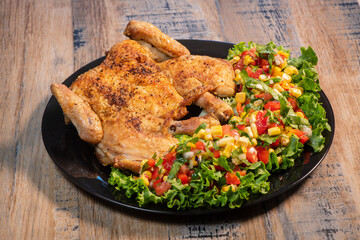 Chicken recipe, roast cockerel and its vegetables, corn condiment