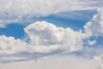 Obraz premium Beautiful white and gray clouds against a beautiful blue desert sky in the American Southwest. Large puffy and wispy cloudscapes, fresh clean air.