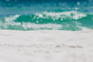 Beach sand and ocean blur background 