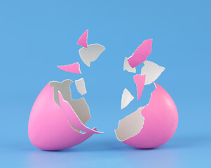 Pink Easter egg broken into pieces and cracked open with space for product placement. - 496223322