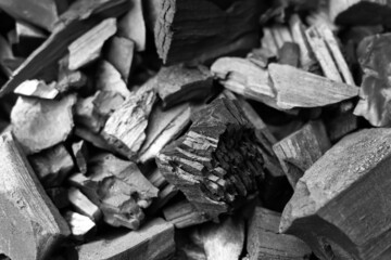 Black natural charcoal pile close-up