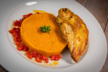 Chicken supreme recipe, gently cooked with 5 spices, sweet potato mousseline, peppers cut in half
