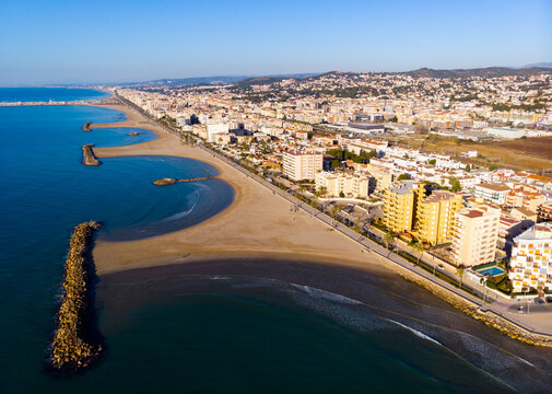 Aerial drone view of Playa de Cunit on sunny winter day, Tarragona, Spain