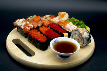 Sushi is an arrangement of sliced ​​raw fish, squid, shrimp, vegetables, etc, arranged on top of rice in various containers called Gomokuzushi.Include Clipping Path.