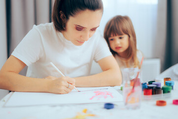 Obraz na płótnie Canvas Kindergarten Tutor Teaching Little Girl How to Paint